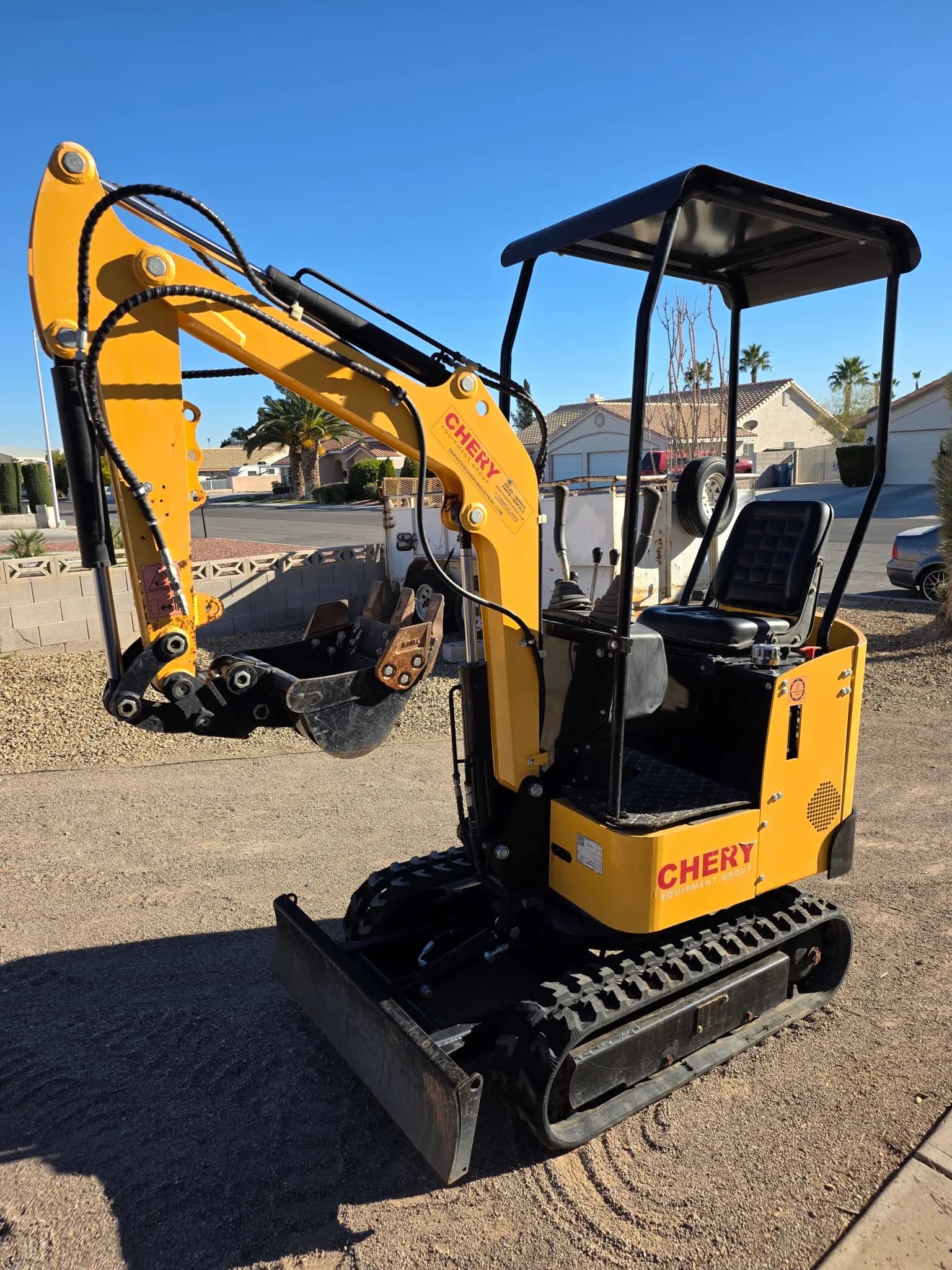 Mini Excavator with Attachments — photo 4 of 5